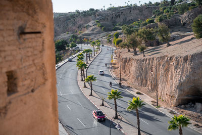 High angle view of vehicles on road in city