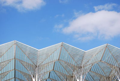 Low angle view of building against blue sky