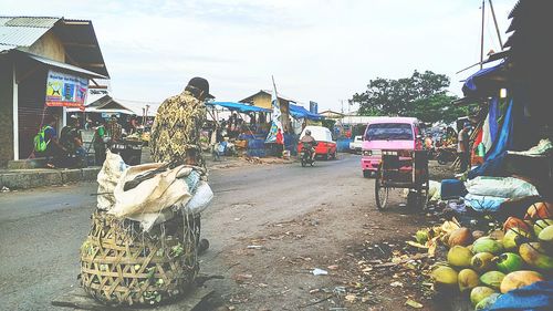 Various market stall against sky