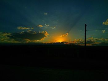 Scenic view of landscape at sunset