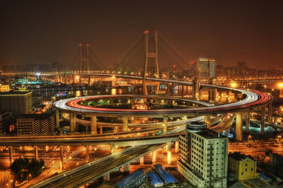 High angle view of bridge over river at night