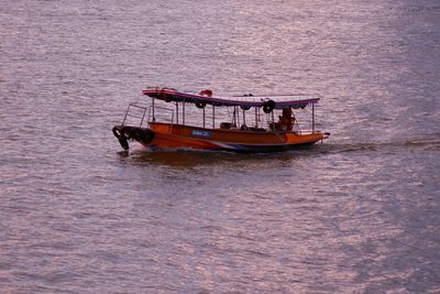 Boat sailing in sea