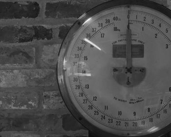 Close-up of clock on wall