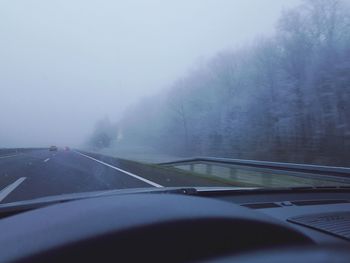 Road seen through car windshield