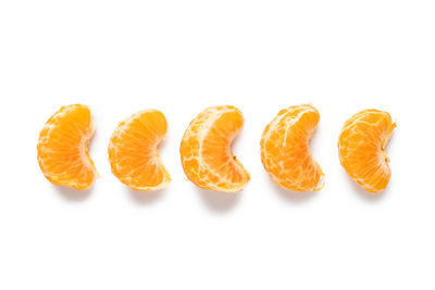 Close-up of fruits against white background