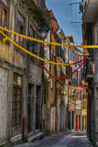 Houses against sky in city