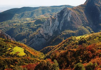 High angle view of mountain range against sky in autumn