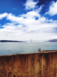 Scenic view of sea against cloudy sky