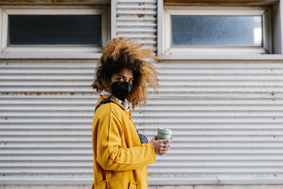 Portrait of man drinking coffee