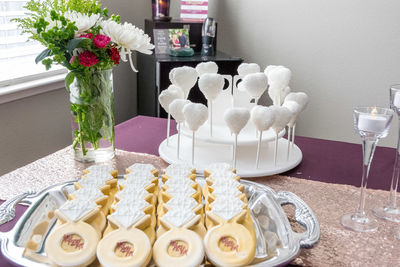 Flower vase on table at home