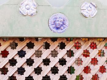 High angle view of carvings on wall