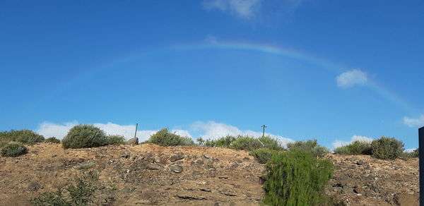 Scenic view of rainbow against sky