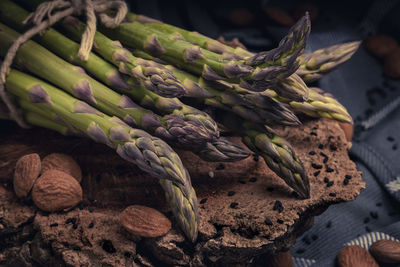 High angle view of asparagus on wooden table