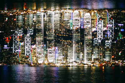 Illuminated buildings in city at night