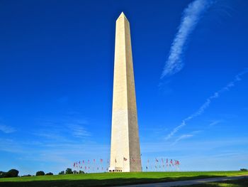 Low angle view of historical building against blue sky