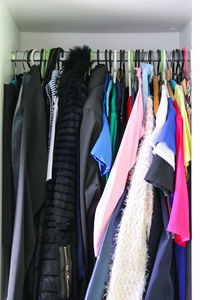 Clothes hanging on rack in store