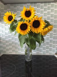 Close-up of sunflowers on table