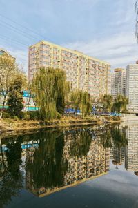 Reflection of buildings in puddle
