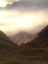 Scenic view of mountains against sky during sunset