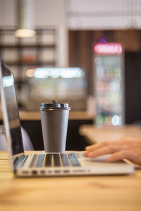 Close-up of coffee cup on table in restaurant
