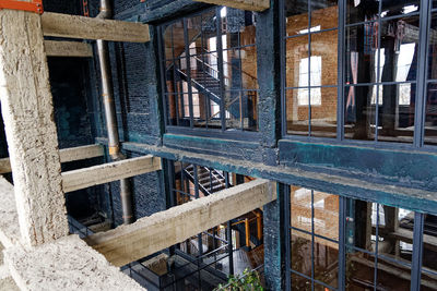 Abandoned building seen through window