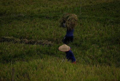 Full length of man working on field