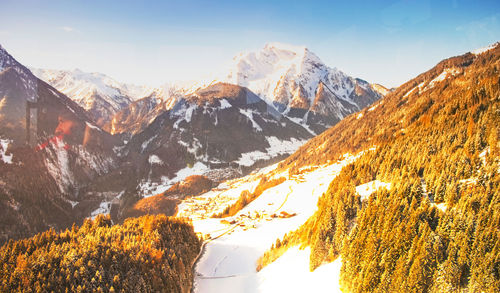 Scenic view of snowcapped mountains against sky