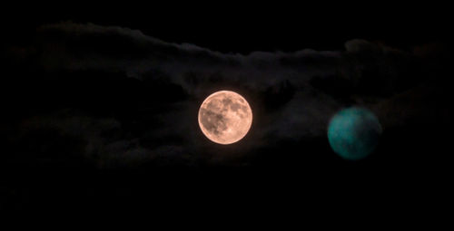 Low angle view of moon in sky