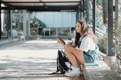 Young woman using mobile phone