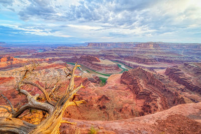 Aerial view of landscape against cloudy sky