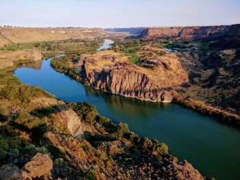 Panoramic view of lake amidst landscape against sky