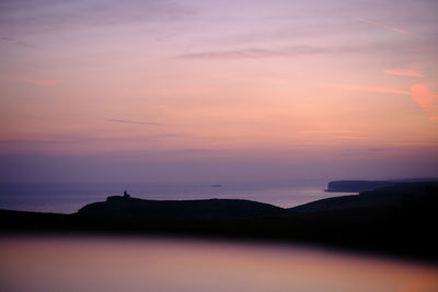 Belle tout lighthouse at beachy head on south downs. cliffs and the english channel in the distance. 