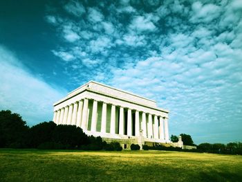 View of historical building against cloudy sky