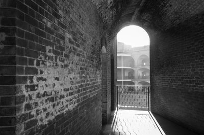 Buildings seen through arch window