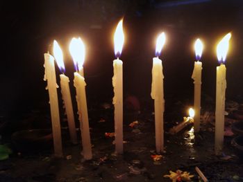 Close-up of burning candles