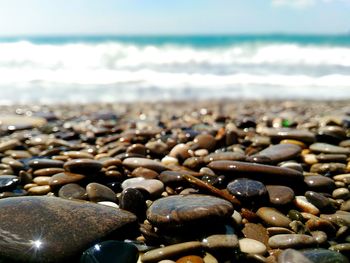 Close-up of stones on beach