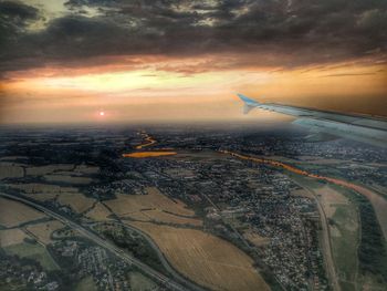 Aerial view of landscape against sky during sunset