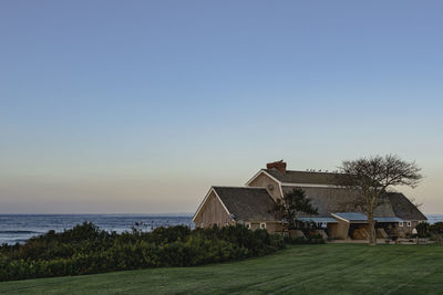 Clear sky and green grass, area view of montauk point state park in a sunset long island ny