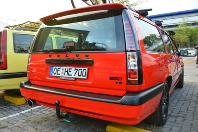 Red vintage car on street