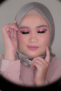 Close-up portrait of a beautiful young woman