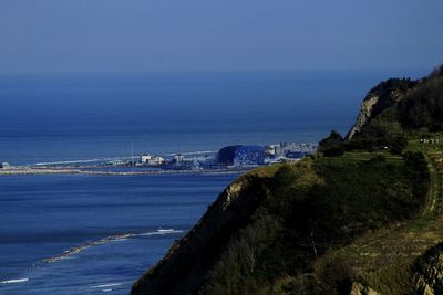 Scenic view of sea against blue sky