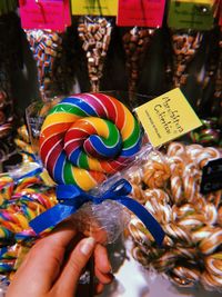 Close-up of hand holding candy