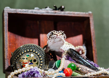 Close-up of buddha statue on table