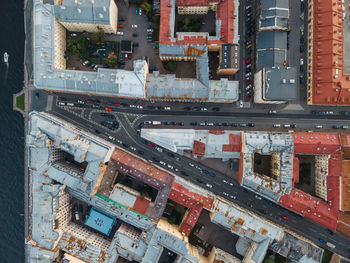 Aerial view on rooftops in st petersburg center. yard-well of old houses and asphalt roads.