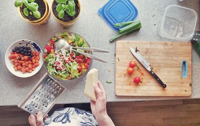 High angle view of woman eating food