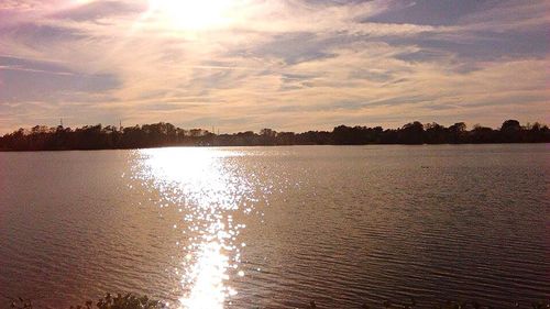 Scenic view of sunset over river