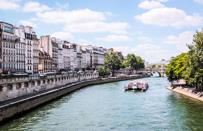 High angle view of canal along buildings