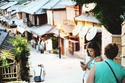 Woman walking on city street