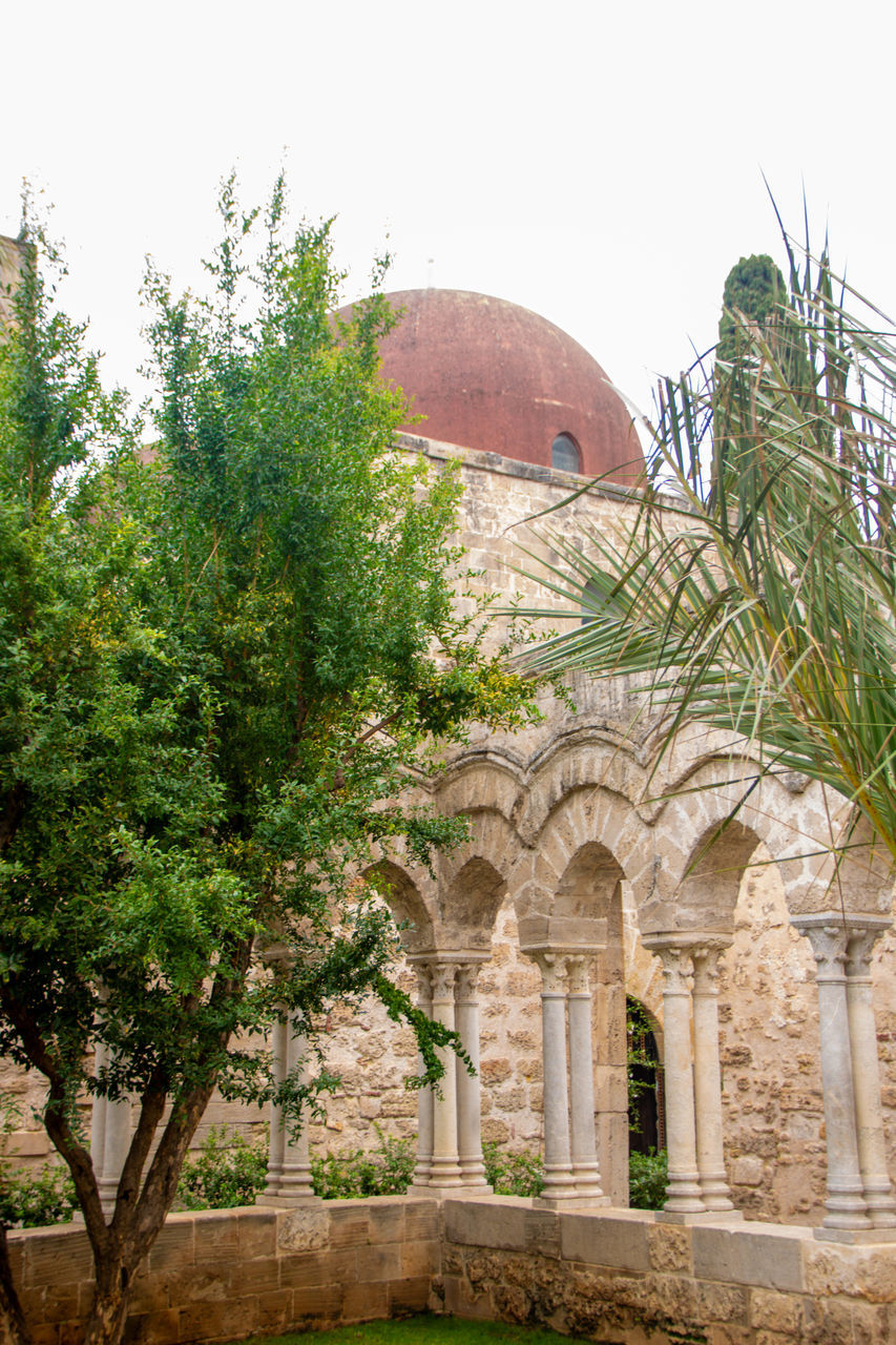 architecture, built structure, plant, building exterior, tree, history, nature, building, the past, travel destinations, travel, religion, no people, sky, arch, tourism, estate, place of worship, outdoors, belief, day, clear sky, garden