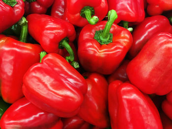 Full frame shot of red bell peppers at market